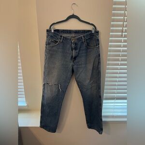 Wrangler Blue Relaxed Fit Jeans with Distressed Details
